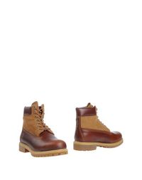 Полусапоги и высокие ботинки Timberland