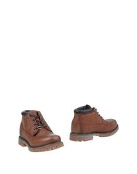 Коричневые Полусапоги и высокие ботинки Timberland