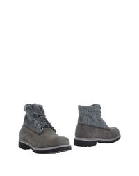 Полусапоги и высокие ботинки Timberland