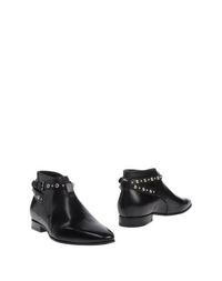 Полусапоги и высокие ботинки Saint Laurent