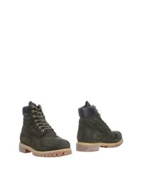 Полусапоги и высокие ботинки Timberland