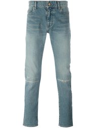 джинсы с поношенным эффектом  Saint Laurent