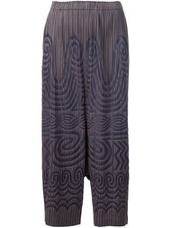 tribal print pleated trousers Pleats Please By Issey Miyake