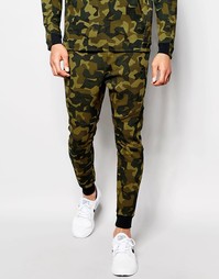 Зеленые зауженные джоггеры Nike TF 823499-347 - Зеленый