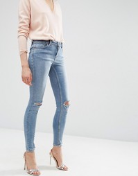 Джинсы скинни из стираного денима с рваной отделкой на коленях и щикол Asos