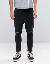 Черные рваные джинсы с заниженным шаговым швом ASOS Spray On - Черный