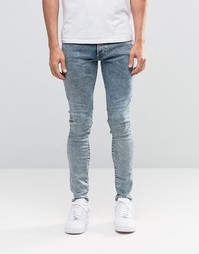 Суперзауженные джинсы с эффектом поношенности G-Star Revend