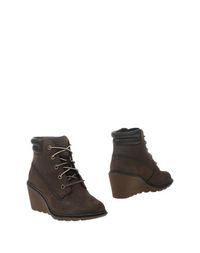 Коричневые Полусапоги и высокие ботинки Timberland