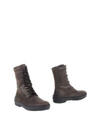Полусапоги и высокие ботинки Tods