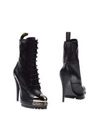 Черные Полусапоги и высокие ботинки Casadei