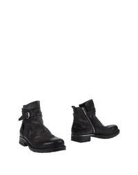 Полусапоги и высокие ботинки Emporio Armani