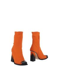Оранжевые Полусапоги и высокие ботинки Msgm