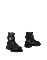 Полусапоги и высокие ботинки Moschino