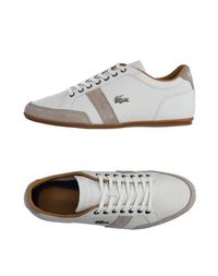 Низкие кеды и кроссовки Lacoste