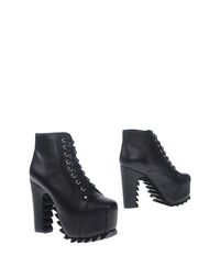 Черные Полусапоги и высокие ботинки Jeffrey Campbell
