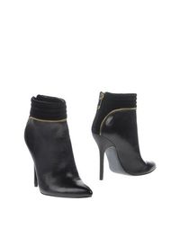 Черные Полусапоги и высокие ботинки Guess