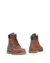 Коричневые Полусапоги и высокие ботинки Timberland