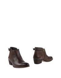 Коричневые Полусапоги и высокие ботинки Steve Madden
