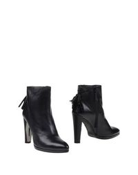 Черные Полусапоги и высокие ботинки Stuart Weitzman