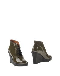 Зеленые Полусапоги и высокие ботинки Emporio Armani