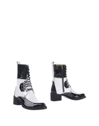 Белые Полусапоги и высокие ботинки Collection PrivĒe?