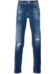 джинсы с рваными деталями Dolce & Gabbana