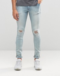 Супероблегающие джинсы с дырками на коленях ASOS - Выбеленный синий