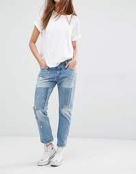 Суженные книзу джинсы с классической талией и накладками Levis 501 CT Levis®