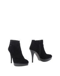 Черные Полусапоги и высокие ботинки Stuart Weitzman