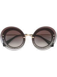 солнцезащитные очки в круглой оправе Miu Miu Eyewear