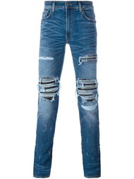 джинсы с рваными деталями   Amiri