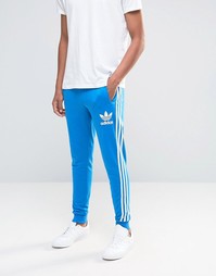 Джоггеры с логотипом-трилистником adidas Originals AY7781 - Синий