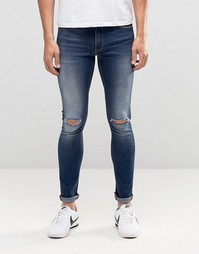 Супероблегающие джинсы с дырками на коленях ASOS - Умеренный синий