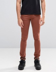 Ржавые супероблегающие джинсы с камуфляжными отворотами ASOS - Коричневый