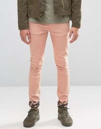Розовые супероблегающие джинсы с камуфляжными отворотами ASOS - Розовый