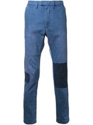 джинсы с заплатками Diesel