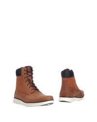 Полусапоги и высокие ботинки Timberland