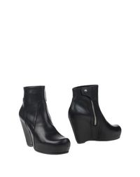 Полусапоги и высокие ботинки Rick Owens