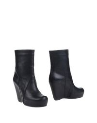 Полусапоги и высокие ботинки Rick Owens