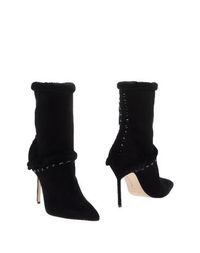 Полусапоги и высокие ботинки Manolo Blahnik
