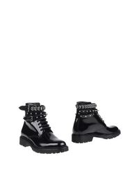 Полусапоги и высокие ботинки Saint Laurent