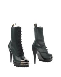 Полусапоги и высокие ботинки Casadei