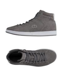 Высокие кеды и кроссовки Lacoste