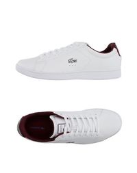 Низкие кеды и кроссовки Lacoste