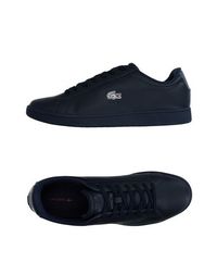 Низкие кеды и кроссовки Lacoste
