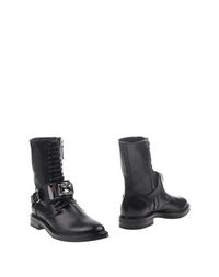 Полусапоги и высокие ботинки Casadei