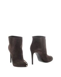 Полусапоги и высокие ботинки Casadei