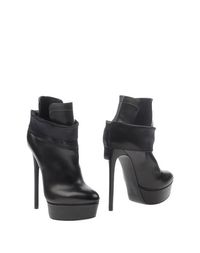 Полусапоги и высокие ботинки Casadei