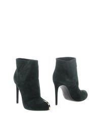Полусапоги и высокие ботинки Casadei