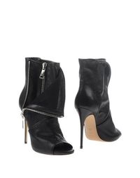 Полусапоги и высокие ботинки Casadei
